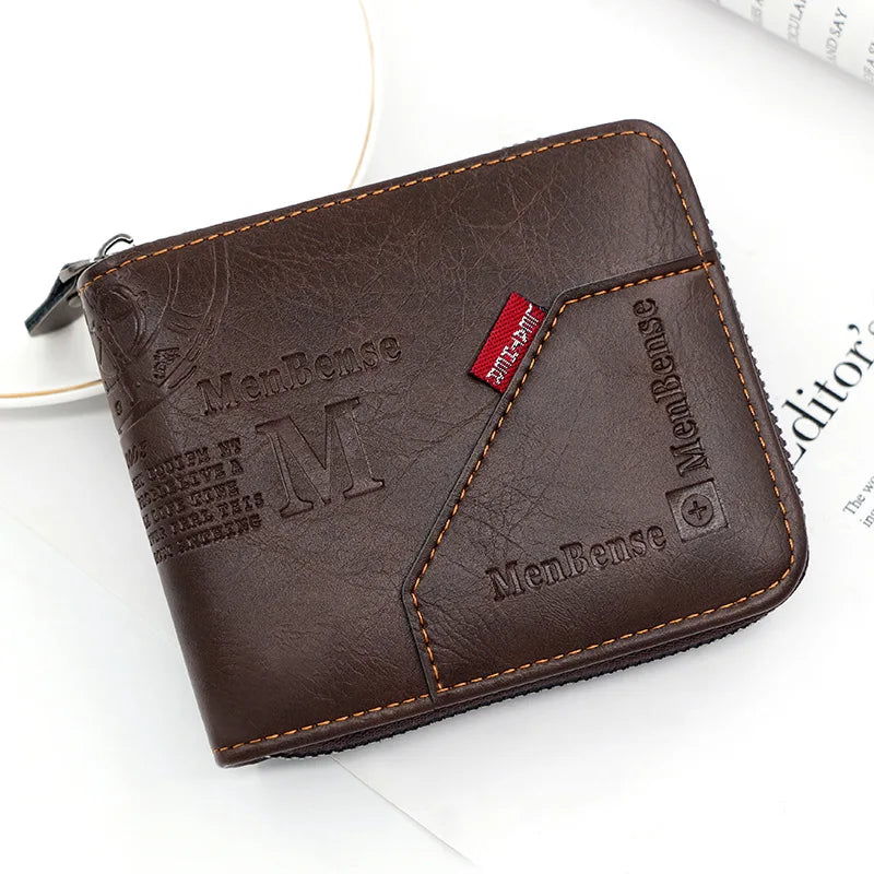 Brown leather wallet with 'MenBense' branding on a white surface