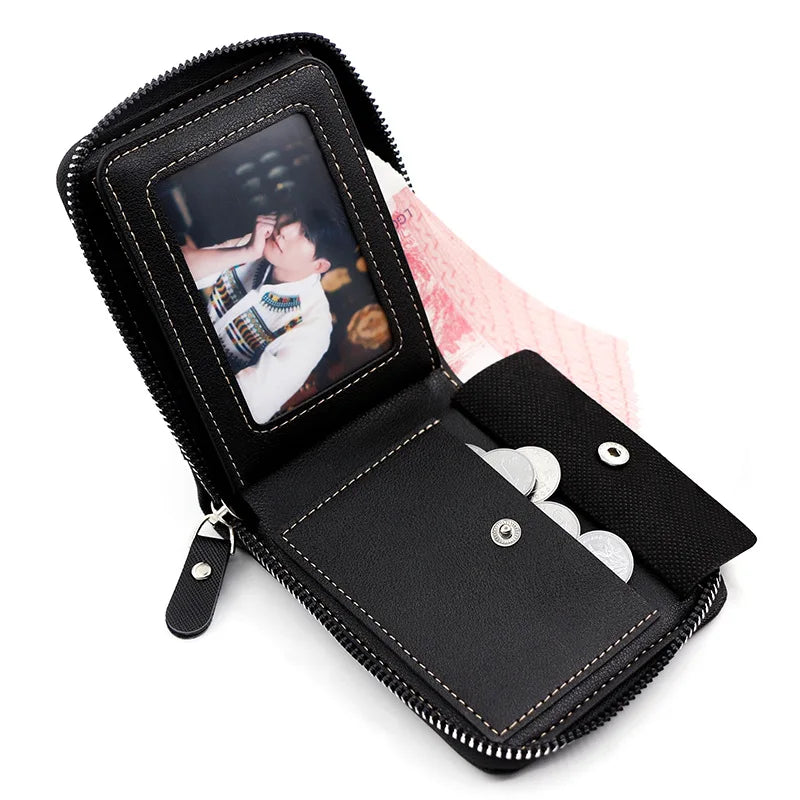 Black zippered case with a photo of a person inside, on a white background